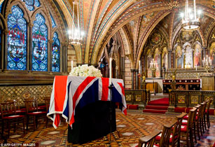 Baroness Thatcher`s coffin is taken back to Parliament